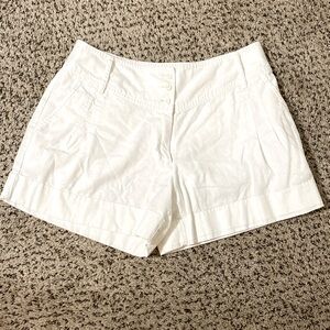 Chico's white woven pleated button front shorts - size 10